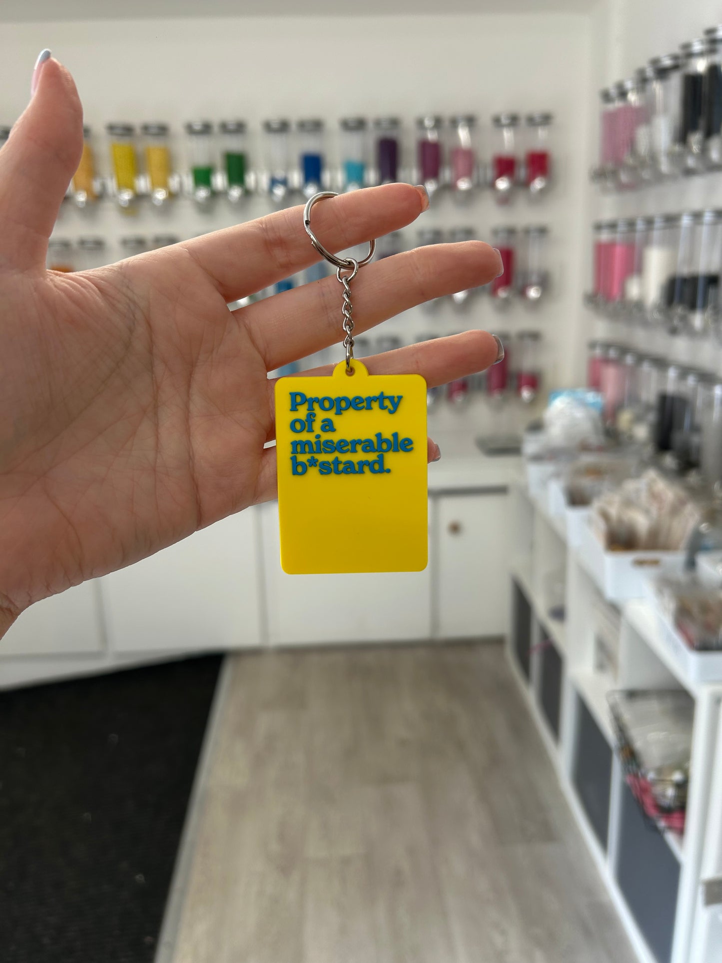 “Property of a miserable b*stard.” Keyring